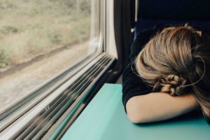Woman Sleeping in Train