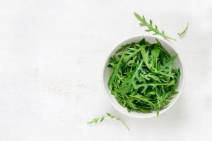 Arugula Leaves in White Bowl